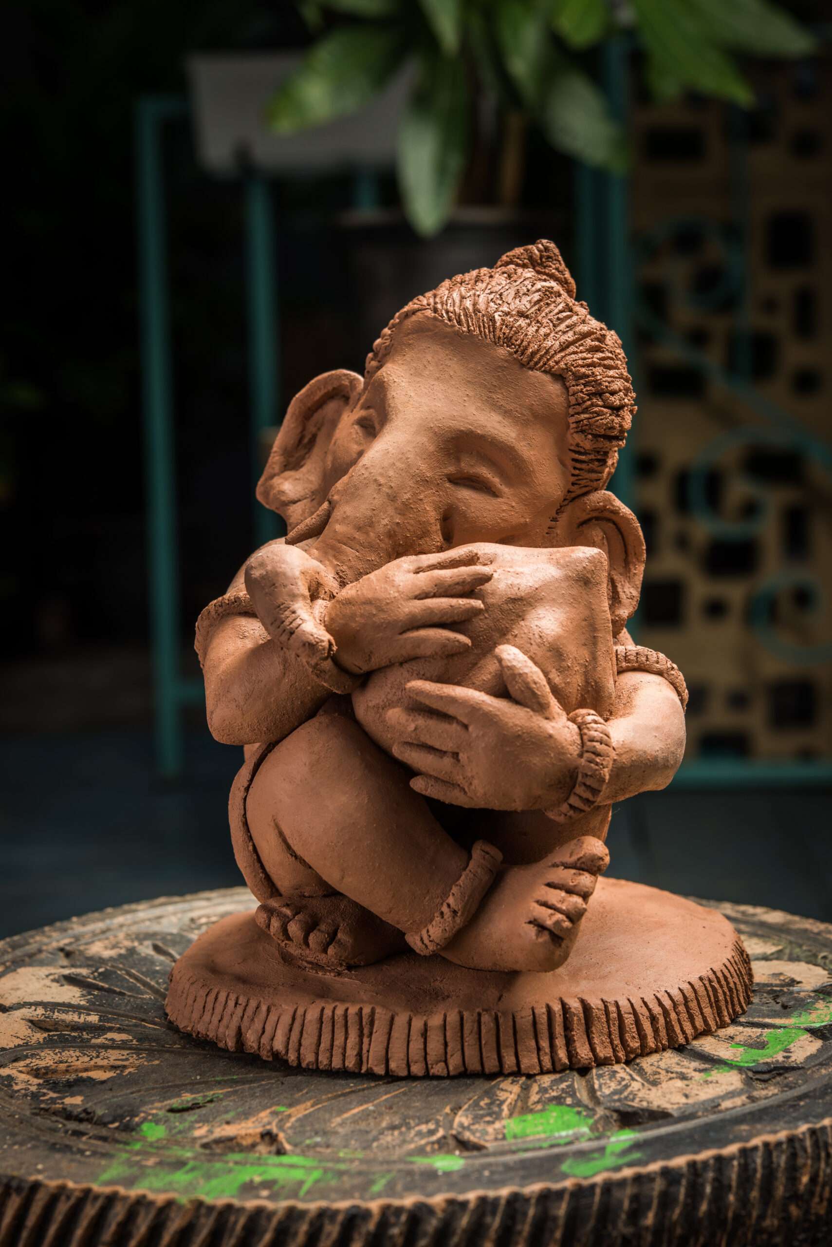 Homemade lord Ganesha idol or Ganapati Bappa murti using dissolvable clay Ganesh Utsav